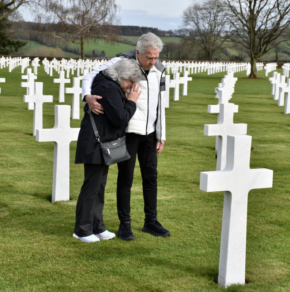 Barb & Bob at the grave of Bob's father